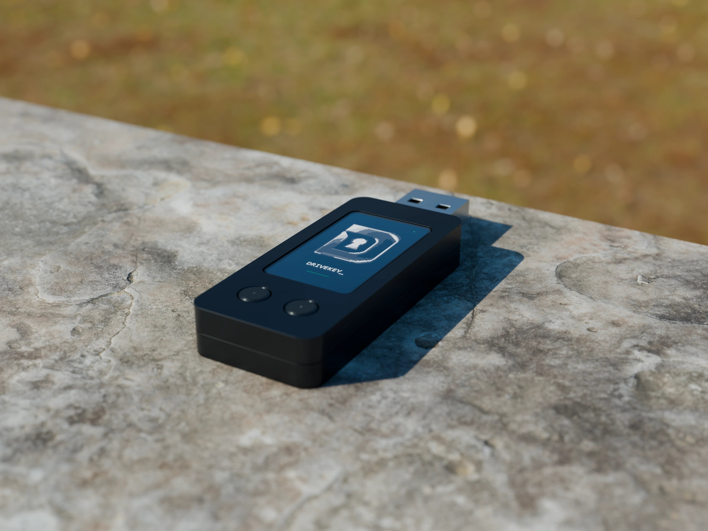 DriveKey USB resting on an outdoor stone ledge in afternoon sunshine